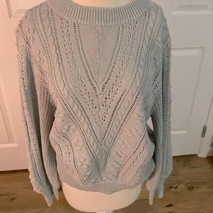 Sage green sweater with beautiful sleeve detailing